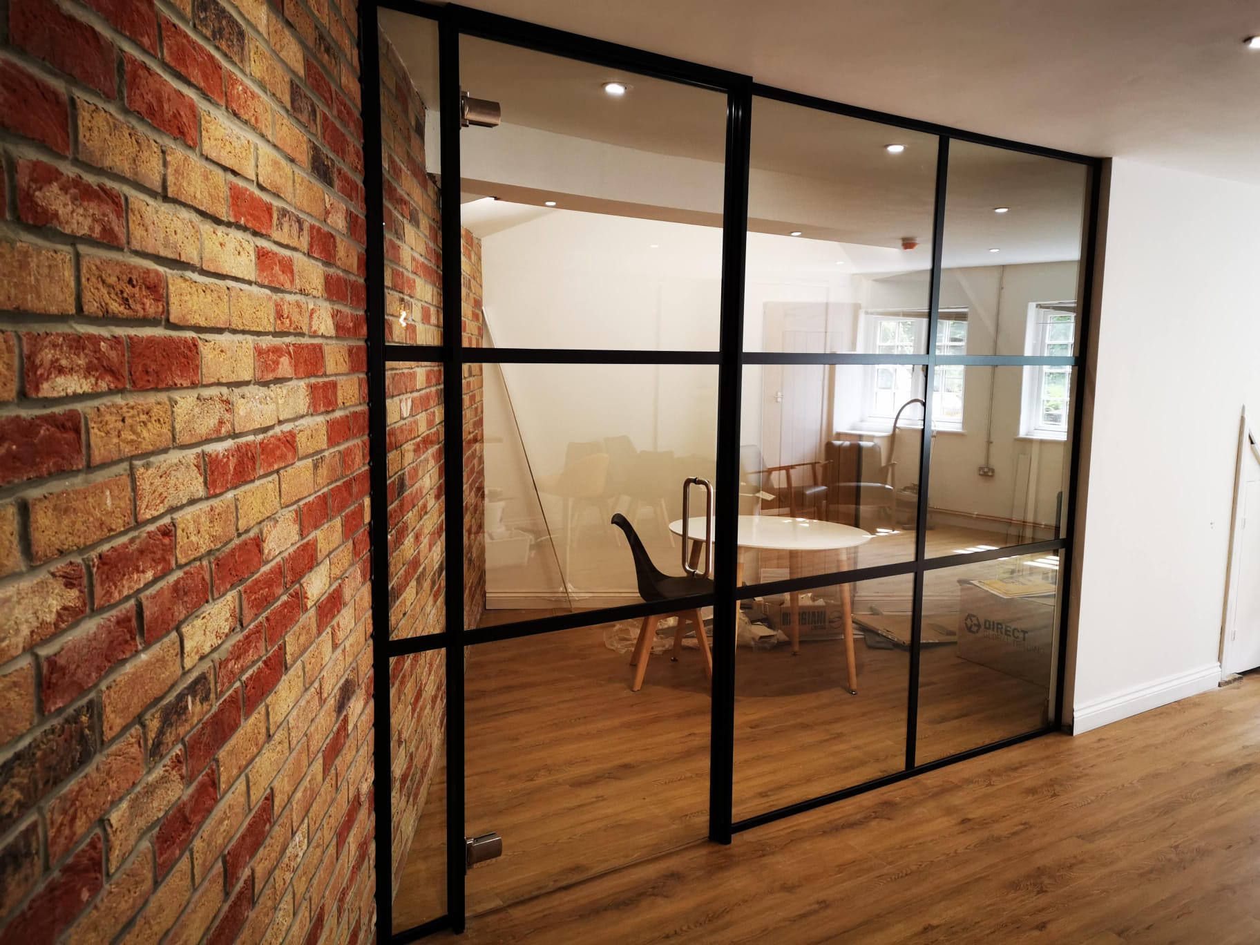 Frosted glass partition for privacy, London office