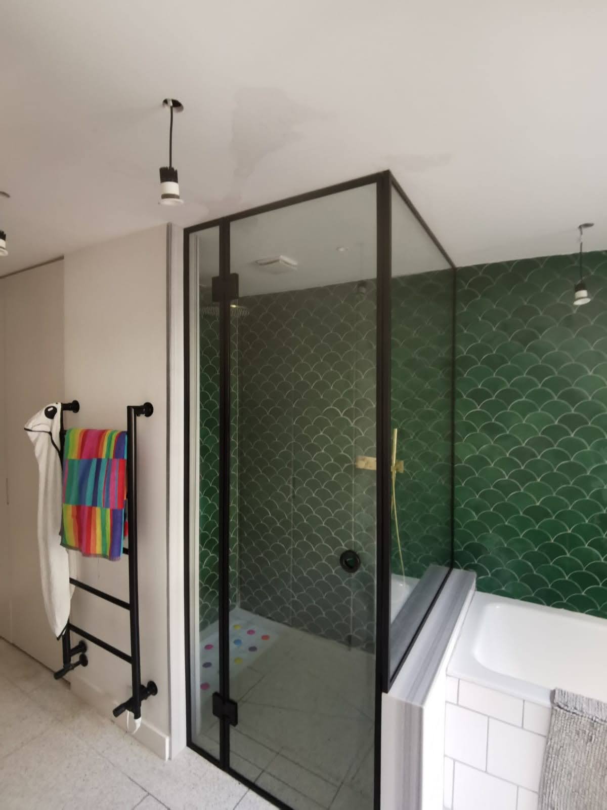 Frameless glass shower screen installation, London